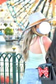 I'm not usually a hat wearer but this hat looks good on anyone. It's big without being overly big. It covers the face from the sun but not quite shoulders so would recommend more for a day out- wear sunscreen - than big hat beach day. My shoulders still got red but my face and pictures looked good thanks to the hat! - Valerie V.
