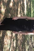 Love the way this dress looks. It fits nicely and has adjustable straps which is nice. The material is a bit thin though and I wish the slit wasn't so high so I wouldn't have to worry about flashing anyone. - Jenna T.