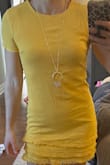 The color is so pretty and I love the detail at the bottom of the dress. Fits more snug in me than the model, but that was my intention. - Emily T.