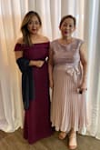 I bought this dress for my niece's wedding. I love everything about it, especially the color. I got so many compliments. I did have to get my dress hemmed, but it was worth it. I'm happy with my purchase. - Razzle D.