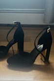 These heels are so freaking cute. I first got them in a lighter color and I just had to get them in black. They go with anything and everything. I wear them to spice up a look and they are comfy to walk in. - Mariel C.