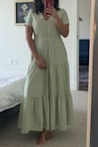 This is a really cute dress for spring! It fits me really well, and the elasticized waist is really forgiving. I am in love with the soft green color, my photo doesn't do it justice. The material is heavier than I was expecting, it's not a flimsy dress, though it might be too warm for summer outdoors. - Luisa L.