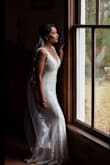 I was having difficulty finding a wedding dress that fits me. Most stores carry size 2. And I'm size 00 and If the size run small I'd maybe wear 0. I ran into Lulus website I figured it won't fit but I ordered several dresses to see which one I'd like and fits better. It helped having other people's reviews and picture. I was skeptical at first because I never heard of this site At that time the smallest size they had for this dress was xs now I see they have xxs. It was one or 1 size bigger. I liked it so I had to take it for alteration The dress is so long had to have it altered overall. But I loved the dress so elegant and made well. The price is great but I had to spend more to alter it wish they had xxs when I ordered mine. This website saves me as I ordered my dress 2 months before the wedding. Loved the dress and got many compliments. Customer service was great too. - Salwa F.