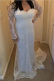 After trying on countless dresses, I finally said "YES" to the dress! I was apprehensive at first since this was a newly added dress and there were no reviews yet. But, I decided to take a chance and I'm so glad I did. The fabric is delicate and classic. It's soft to the touch and it hugged me in all the right places. The details of the dress are just perfect and it truly feels special. It's very much a backless dress, but I plan on wearing a veil anyways. I immediately knew it was the one once I slipped the dress on. I felt like a true bride and really beautiful. I can't wait to get married in this beautiful dress! - Christine N.