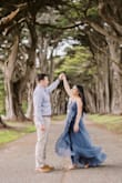 This dress is PERFECT for photos. It looks like a million bucks in photos! Look at that twirl and the way is captured in the pic - amazing! I have a regular sized bust and larger hips. This dress fit like a glove! Very flattering in the stomach area. - Amanda R.