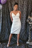 This dress came in a very timely manner, and I had no issues with the ordering process. It looks absolutely stunning, exactly like the picture! I strongly recommend ordering 1 size smaller than what your measurements line up with on the size chart (for example, my measurements line up with the Medium, I ordered a Medium and a Small, and the Small fit PERFECTLY). The fabric of the dress doesn't have much stretchiness to it, but if you're able to maintain your figure, I see absolutely no issues with ordering a size down. - Brittney J.