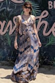 There is something about this print that transports you to another time. I like this halter style - I do have a smaller chest/don't have to wear a bra so that makes it more feasible for me. Washes normal which is a huge plus. - Shoko R.