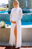 I am 6 months pregnant and decided to have a courthouse wedding. I bought this dress for the wedding along with countless others but ended up going with this one! I did have to make alterations because I'm bigger than I normally am, otherwise I believe it would have fit perfect. I had an inch maybe taken off the bottom, I had the back zipper let out so that it would zip, and for my own taste I had the slit taken much higher up my leg (I have short legs so the slit was not high enough for me) it turned out great! - Christina W.