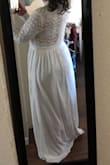 I loved the winter princess look of this dress, but it didn't look flattering on me. In the front, the bodice lining came down a little low and I didn't like the flat bodice neckline. I realized I wanted something more sweetheart or v-shaped. The lace pattern is very cute though. - Lauren K.