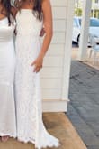 I purchased this dress for a black tie event I was attending at my university. All girls had to wear long white dresses and this one was absolutely beautiful. It was elegant and very flattering. I received so many compliments on it! Definitely hoping I will get to wear this to another event! - Katrina O.