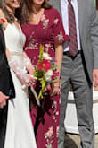 I bought this for a wedding. I weighed 149 when I tried it on and I felt a medium was a little small as my chest was straining it. A $3 cami took care of the the cleavage. I also lost 9 lbs before the wedding and It fit great!!! I was really happy with the dress. - Rahn J.