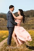 Wore this dress for my engagement photoshoot and it looked so great in the photos! And I loved walking around in it, it's very flowy. I ordered a large and it fit perfect around the bust but since I'm only 5'5", I had to get it hemmed which surprisingly wasn't too pricey since the dress material is rather light. - Cheyanne L.