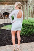 I wore this dress for my bridal shower and I got so many compliments. It's adorable & has a classy, fun, sassy feel with the open back and lace long sleeves! I am usually in between a small and a medium at Lulus and I had to go with a medium for this one due to the length. - Stacie N.