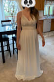 I love the fabric and the cut of the dress, very well made. The beading in real life is absolutely gorgeous, but unfortunately it does not photograph well at all the beading just looks like plain stitching and photos do not do it justice. For that reason, I am not keeping this dress :( It does run pretty big in the bust and ribs, I would need either a smaller size or have to have it taken in. - Jessica J.