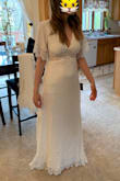 This dress is so well made, love the detailing. However, if you don't have a very flat stomach, I would not recommend this dress. Even with shape wear, the way that the dress is cut seems to highlight your midsection, and not in a good way! And while I do love the feel of the fabric, it clings in ways that I don't want it to. Pictured, I am wearing the XS. The small is huge everywhere, except still cut too strange and small in the midsection. This would look amazing on someone with a perfect tummy though! - Jessica J.