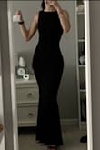 Fits perfectly! Love the open back and the knot detail. I'm 5'7" and this was the perfect length with a pair of shorter heels. - Thea Z.
