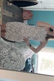 I'm in between sizes so I ordered a small and a XS and the XS hugged my body perfectly! If I had bigger boobs or butt I would go with the small. The straps are adjustable which I LOVEEE. Can't wait to wear this for my graduation! - Maddie F.