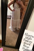 I planned a last minute wedding and had ordered two dresses from here I decided on this one. It was simple and yet perfect for an outdoor wedding! It did fit tight a little tight I ordered a size small but looked beautiful on! - Michele T.