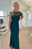 This color was so pretty on my daughter! She is very short so we needed it hemmed but it turned out so perfect. - Heather C.