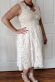 I returned this one because it is way more brown and off white than looks in the pictures. It was tight in rib cage area. Very stylish dress, just not right color for me. - Jill F.