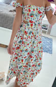 Love this dress, I've gotten so many compliments on it. I usually wear a small, but since this is pretty much a strapless dress, and I have a small chest, the XS ended up working best because the top part is super stretchy, so it fit snug without slipping down. The bottom is flowy so I didn't have any issues with it being tight anywhere else! - Andrea B.