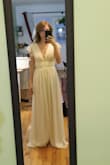 I am totally in love with the dress. Great quality, different layers, even some silicone in the shoulders to avoid sleeves falling down. My measurements fit with a size S (following the chart and the specialize advise) but I ended up ordering an xs (based on pictures of other people) and xs is definitely perfect. - Elena R.
