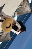 Not only is this a beautiful hat, but it is like a personal shade umbrella.  It was so perfect! I wore it in the pool and it got wet, but I laid it flat to dry and it was good to go. My favorite Lulus purchase!! - Crystal C.