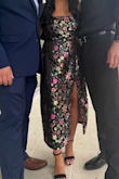 It was roomy in the bust and I had to pin it in the back! It was also big in the hips and I had to get it taken in, but I love this dress overall!!! - Chelsie R.
