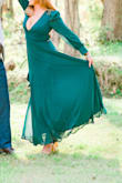 I love this dress and got so many compliments! The color is gorgeous and the fit is perfect! I am a size 8 and a medium was just right! Be aware: there is NO stretch in the material. I wore it to a mountain wedding in April and was comfortable until the sun went down - the weight is enough to keep you warm enough, but no too warm. - Christina M.