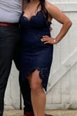 I am 4'11 and athletic build and this dress fits me so perfectly! Finding a good dress that is knee or mid length is so difficult without it looking like a dress that I bought too big. This dress hits all the right places. I am pretty large bust (32DDD) and I can fit it. Smaller chested girls would also look great in it! I originally bought two dresses, one for wedding 1 and this one for wedding 2. I love this dress so much I am wearing it to both. The adjustable straps saved me and the open back is so flattering! Can't tell y'all how much I love this dress!! - Brianna C.