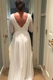 This dress is gorgeous with great material.
I was unsure about the size, but I'm glad I got an XS -it fits perfectly. It is a little long, but high heels will solve this problem.
I wore it to my mini wedding celebration and I loved it! - Paula R.