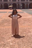 I wore this skirt on my trip to Puerto Rico! I had to wear it to travel because once I landed I didn't have time to change before touring the city! And let me tell you, super comfortable to travel with. The slit was perfect, wish it was higher but it worked lol. The material didn't bother me at all in the heat! Loved the length for my height. When I took photos by the fort close to the beach, the breeze blew it so nicely for a great photo! Fits true to size, I got a L. Highly recommend for spring or a cool summer night! You can dress this skirt up or keep it casual! - Rochelle S.