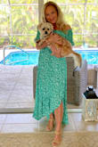Love this dress! The green color is gorgeous and the material is flowy and beautiful. I wore it for my birthday dinner and received many compliments! The fit was great ( XXS) except I did have to have the dress hemmed, but was expected as I'm 5 feet tall. - Valerie A.