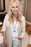 Wore this sweater with a column of white and received many many compliments! The feel is very luxurious and the color elegant. Will remain in my closet for many years. - Lisa P.