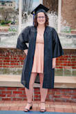 I love the color, fabric, and feel of this dress! It does run a little small, so I would size up. Love the way it looks. Ordered for my college graduation, but can be worn for any occasion! - Carly H.