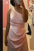 Very nice color and material, but I bought this for prom and it gives me more bridesmaid. It also is a little big, but I am on the shorter side. - Nandi M.