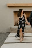 I bought this dress for my engagement pictures, and it was supppeerrr cute! It fit pretty well, but I did get a little scared that one of my boobs would kind of pop out since the front is so open. Luckily it didn't, but if you're on the bustier side and don't want your cleavage out, I would get a size bigger or pin it. - Kristina N.