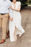 I had to get it hemmed since I'm on the short side, but once I did it looked amazing! Probably best to have some type of tape to hold the shoulders down, otherwise you may accidentally flash a boob pastie to your photographer while moving around for pictures. - Brett B.