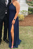 I am 5'5 so the dress was a little long on me but nothing a pair of heels cant fix! The dress was a beautiful halter and the back was so flattering. The slit was perfect and not too revealing but still showed. - Lauren S.