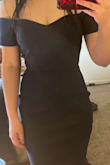 I would size down. The dress bunches in the hips making it an unflattering fit. The bust is very comfortable. Hope the xs isn't too tight. - Kendra T.