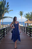 Stunning dress, get tons of compliments on it when I wear this. The underskirt shrunk on it but I really love the dress so I had a seamstress sew in a longer nude underskirt. - Laura
