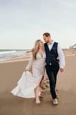 I had my dress altered from bell sleeves to tight sleeves all the way to the wrist. The alteration was perfect for what I wanted. I wore a body shaper underneath. This dress absolutely made my elopement perfect and the shipping/return policy made it easy to order multiple dresses before I chose this one. I'm so happy with how it turned out! - Alicia O.