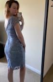 This dress has a lot of give so it's easy to move and flattering on curves. Since I first bought it I gained 10lbs and went up a cup size and it still fits!!! (new measurements accurate on profile and pic is recent) With my short legs, it hits my knee. Only problems are it's hard to raise your arms since the lace material is stiff and this material makes the zipper keep sticking. - Katie B.