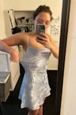 I ordered this to wear as a wedding guest in Las Vegas in May. I got it because I wanted something light that wouldn't kill me in that desert weather, and I had been wanting a satin dress for a while. I am usually a S if the dress has some sort of stretch, but the description said that this dress didn't so I ordered a M and L just incase. The medium ended up being too loose on my sides, but I was scared to order a small because the dress as it is is a little short, but nothing bad. I came back to the site to order a small anyway but they had taken it out of stock, which was weird! Anyways, the dress fits a little big, if you're between two sizes order the smaller one. I am having to take mine to a tailor to get it taken in about an inch on each side. Also the cowl neck is kinda weird, I have small boobs so I'm not the BIGGEST fan but it's alright, I might put a stitch on the inside of it to make it look runched in the front. The color is beautiful,  I paired it with nude shoes, beige scarf, and brown clutch. - Amanda M.
