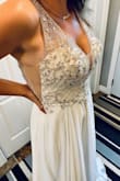 Took a large chance ordering a dress online... for my backyard wedding and this dress went above and beyond my expectations. It fits like A GLOVE. the beading detail is stunning and I can not say enough good things about it. The quality, style, fit, price. Everything was perfect - Sherry D.