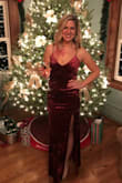 I bought this dress for our family Christmas party, and I wore it again at Valentine's Day. This dress is so flattering! The length was perfect and the slit was not too high. The velvet material is so soft! I have gotten lots of compliments on this dress and I love wearing it! - Kristin V.
