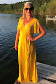 This dress made me love wrap dresses!! I love the color and the fit! It looks good on me whether I am tan in the summer or not. I get compliments whenever I wear this! The only complaint I'd have is that it wrinkles easily... but it's so worth it! This dress is gorgeous! - Kristin V.