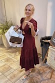 This dress is the perfect amount of fun and sexy. Very comfortable! The color is such a beautiful burgundy. I love this dress. I got so many compliments. - Britney N.