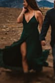 I ordered this for our engagement photo shoot on a summit, and it couldn't have been a better fit for the dramatic landscape. The slit does go WAY up so there were some scandalous moments with the wind, but I don't imagine most people hike a mountain on a windy day in the dress. I'm 5/2 and it was only a little too long for walking. I will say the thin straps on a decently heavy dress started to get a little uncomfortable at the end of three hours, but it was worth it. My photographer gets a lot of amazing credit (@kmm photography LLC). I also loved the customer service. The shoot ended up coming together a bit last minute, so I ordered six dresses at once. They got here in time, tried them on and returned all but this one. The credit came through quickly. - Susanna S.