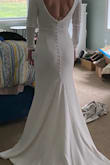What I did like about this dress is that the arms are perfect. In comparison, I ordered a size 0 from David's and the arms were 4 inches too long and an inch too wide. A $400 dress would cost $600 to alter, whereas this dress just needed hemming. It is of very good quality. - Barbara S.